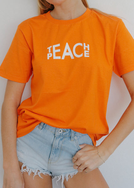 Teach Peace (orange tee)